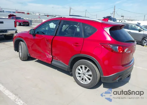 2014 Mazda Cx-5 Touring z USA, uszkodzony, nr VIN JM3KE2CY3E0415576